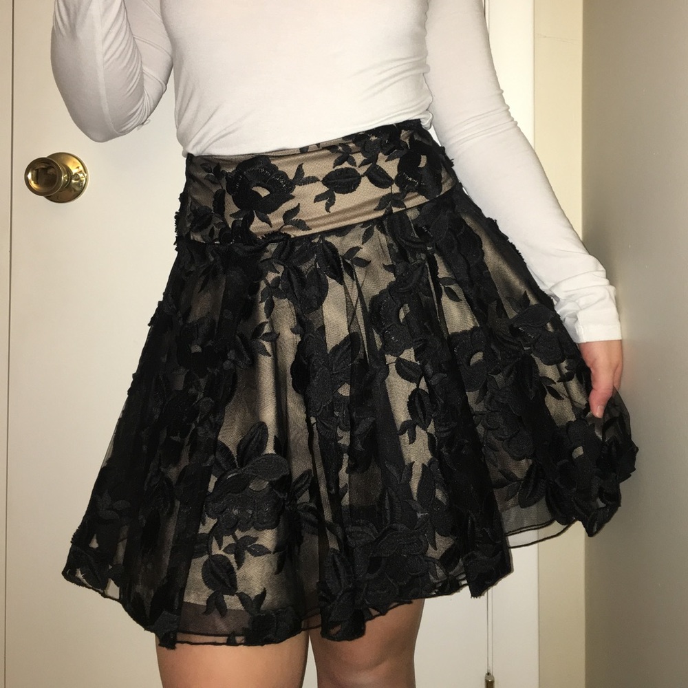 Black BEBE floral lace skirt